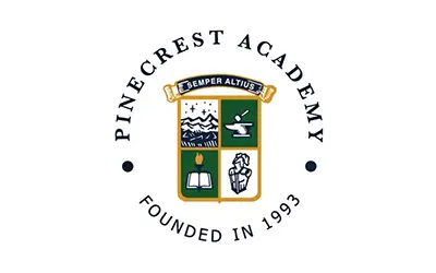Pinecrest Academy logo.